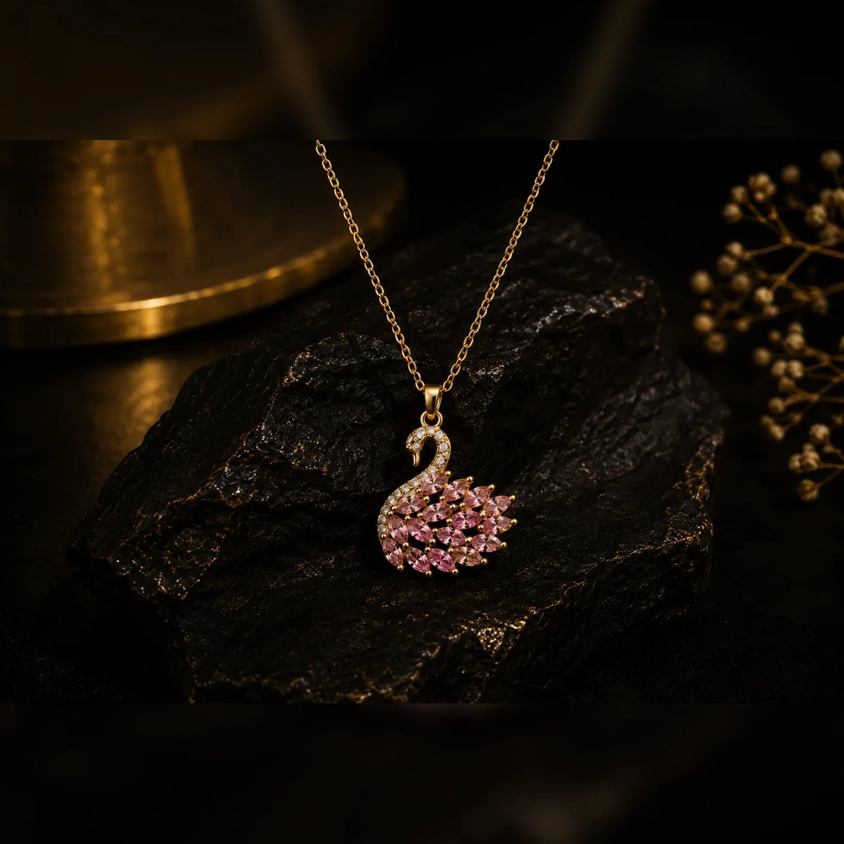 Gold and pink crystal pendant necklace detail