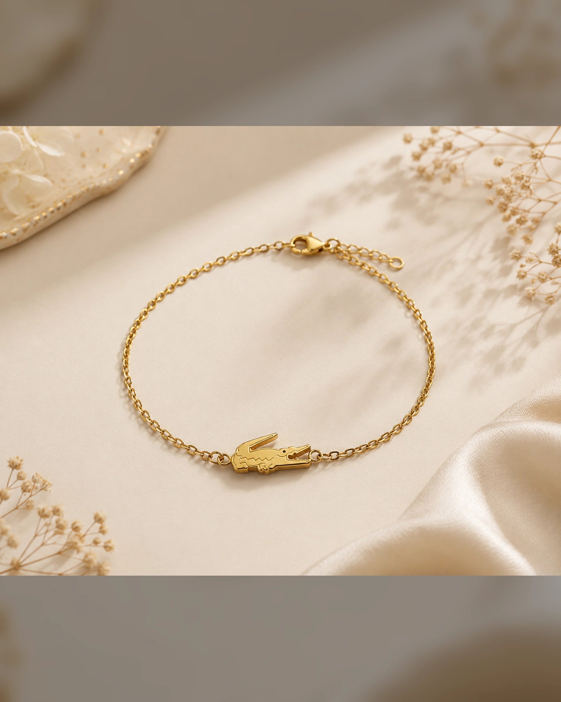 Lacoste-style women's bracelet in gold, worn