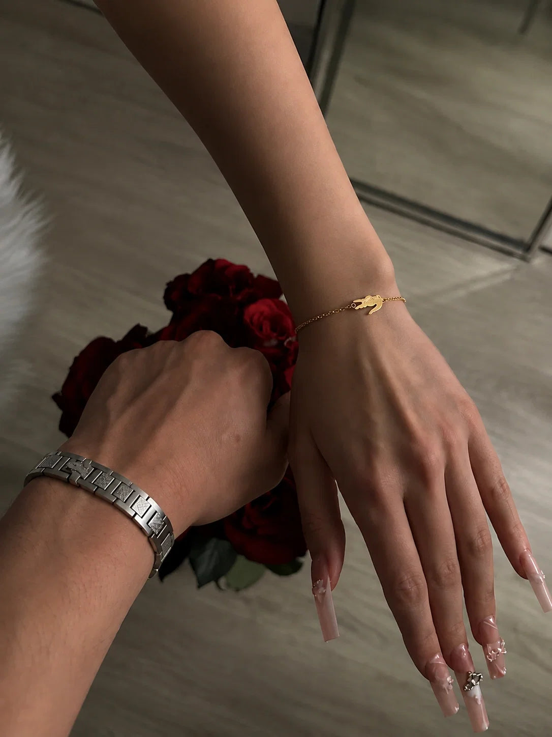 Matching couple's bracelet set worn on the wrist