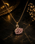Swan necklace in gold and pink