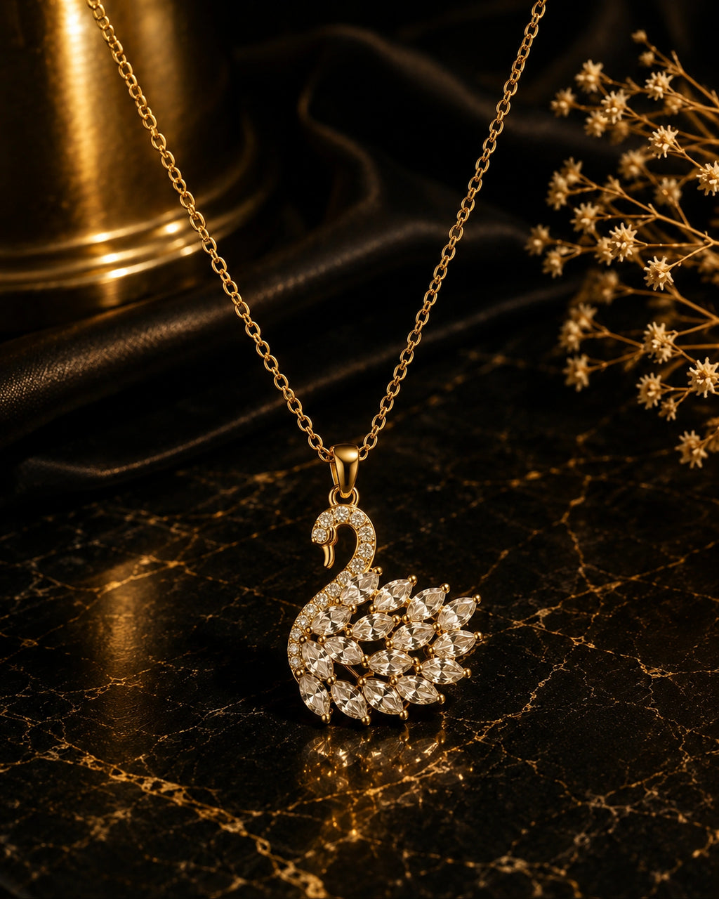 Swan necklace in gold and silver